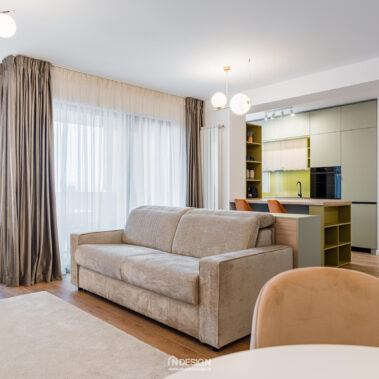 canapea extensibilă living open space apartament modern amenajare contemporană București