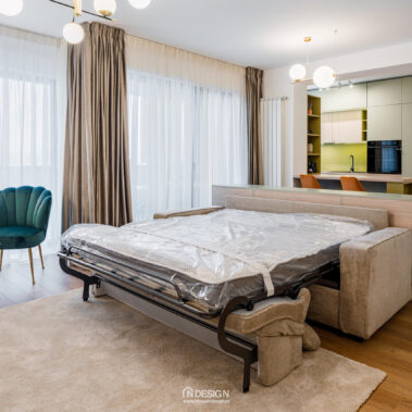 canapea extensibilă living open space apartament modern amenajare contemporană București